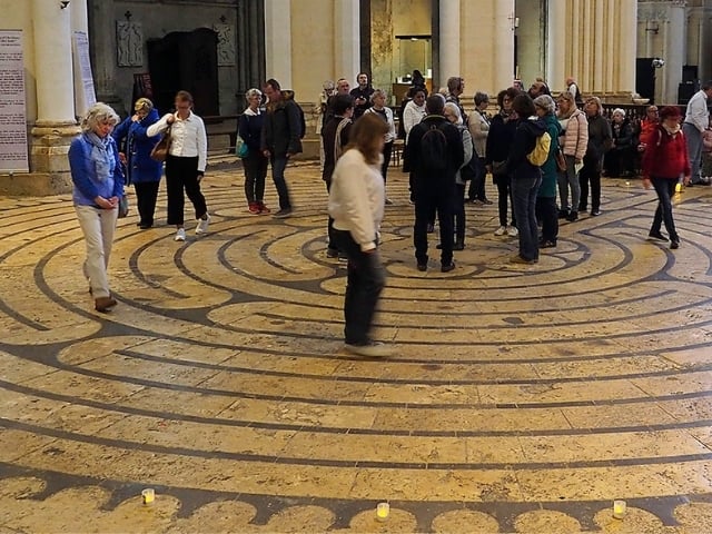 group of people walking a labyrinth 