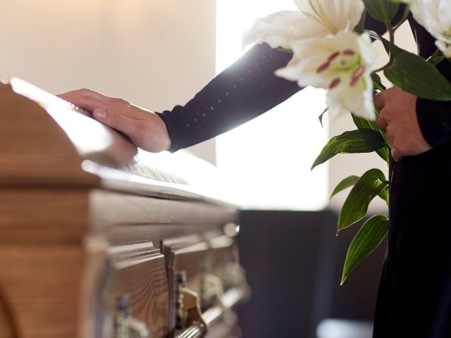 person at funeral