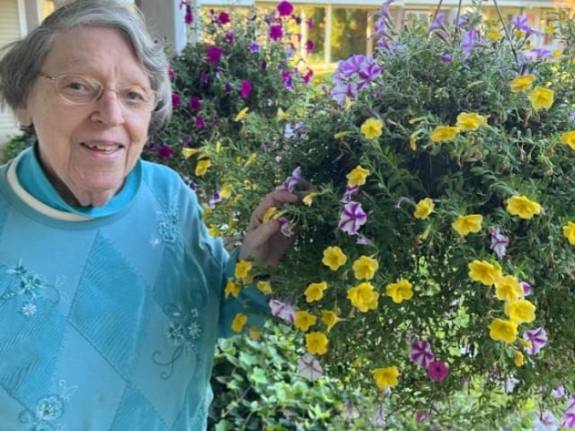 Priscilla and her hanging flowers 