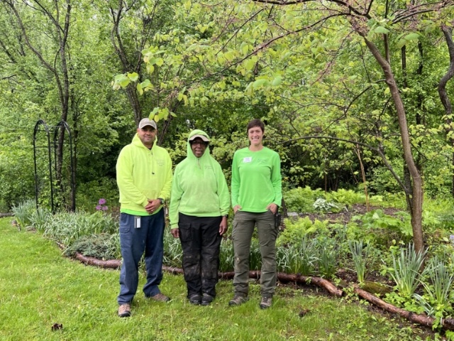 Facilities staff standing outside 