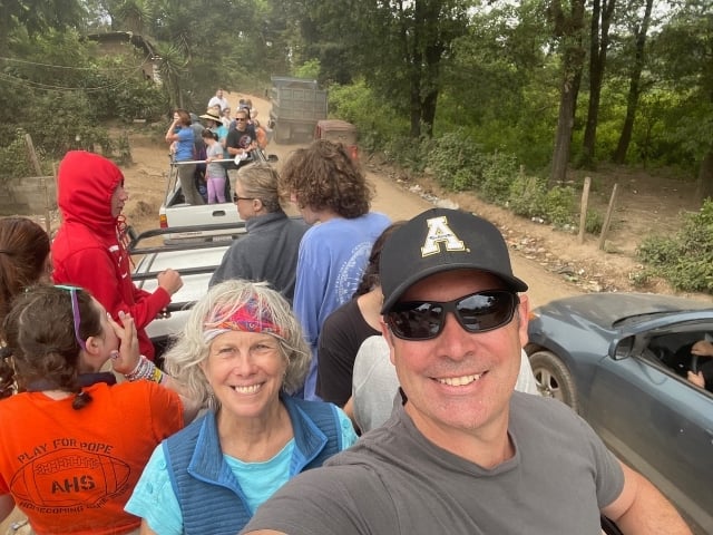 Molly with Adam in the back of pickup