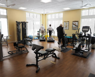 People exercising in a Gym
