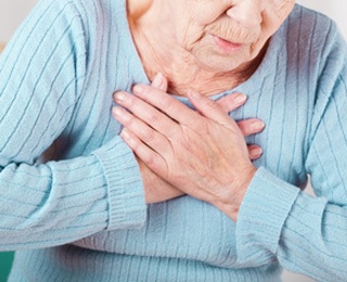 chest-pain-woman.jpg