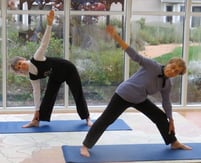 residents in yoga poses