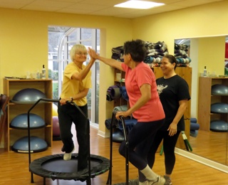 2 older adult women on exercise trampoline