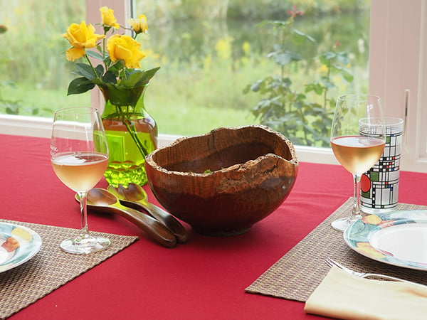 Wine and salad on dining table