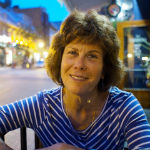 Woman in a striped shirt smiling