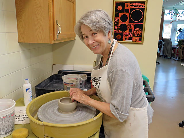 woman at pottery wheel