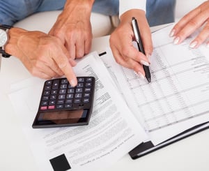  Senior calculating finances for life plan community