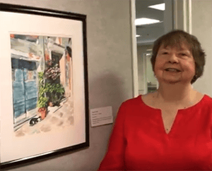 Sharon Furow shows her watercolor painting at Kendal Creates.