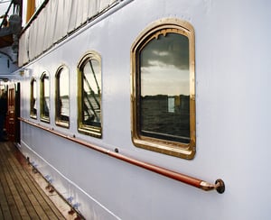 Romantic getaway on Queen Mary 2 boat showing the windows on one of the decks