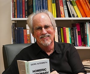  Resident reading one of his top picks in library